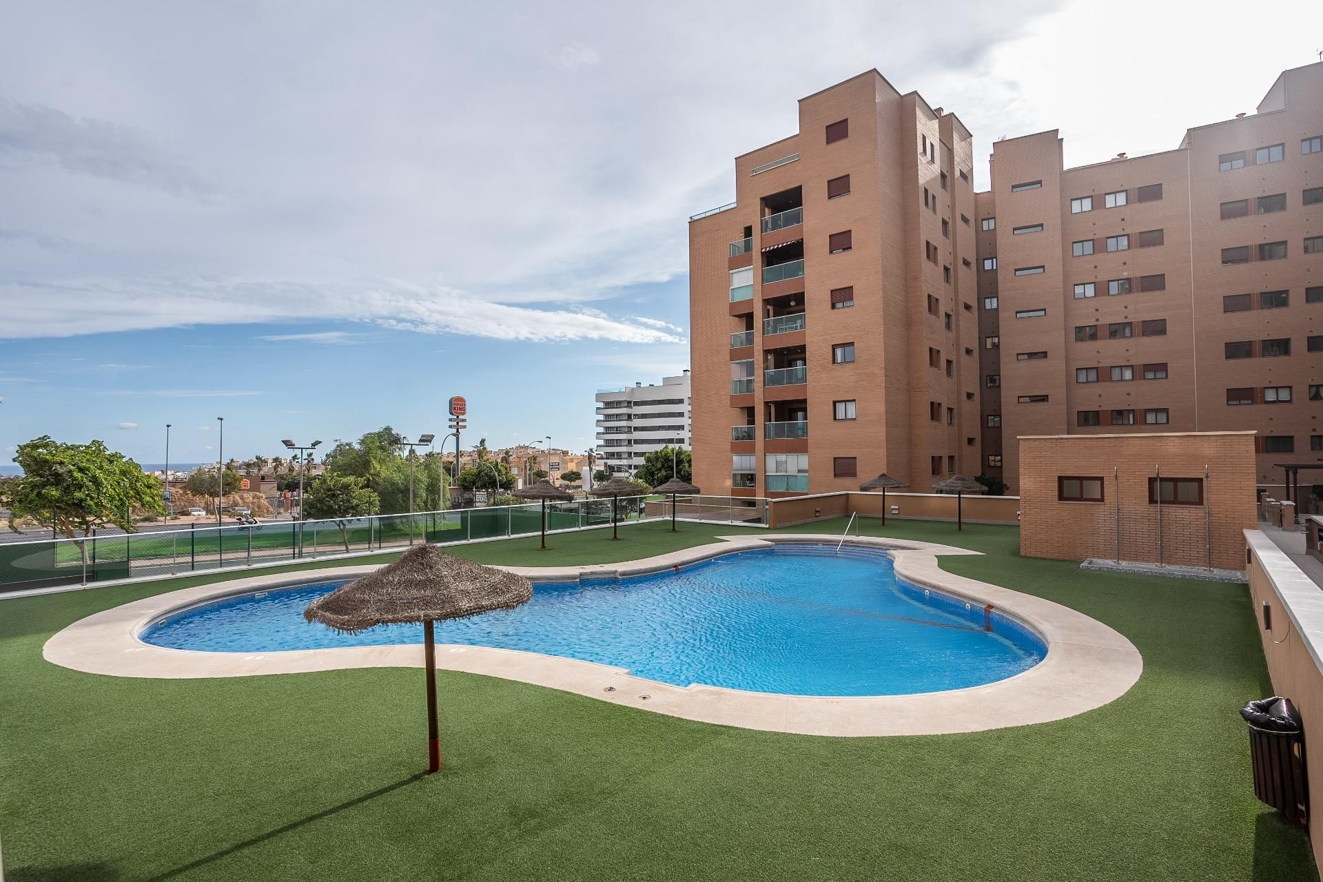 Swimming pool of Planta baja for sale in  Almería Capital  with Air Conditioner, Terrace and Storage room