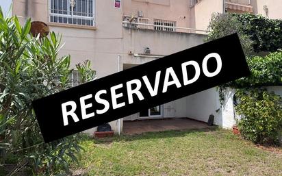 Jardí de Casa adosada en venda en Roquetas de Mar amb Aire condicionat i Jardí privat