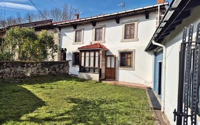 Vista exterior de Casa adosada en venda en Las Rozas de Valdearroyo  amb Jardí privat i Moblat