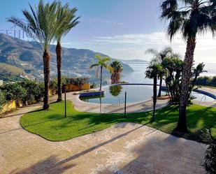 Swimming pool of Single-family semi-detached for sale in Almuñécar  with Air Conditioner, Terrace and Community pool