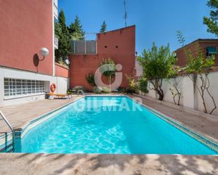 Swimming pool of Flat for sale in  Madrid Capital  with Air Conditioner and Terrace