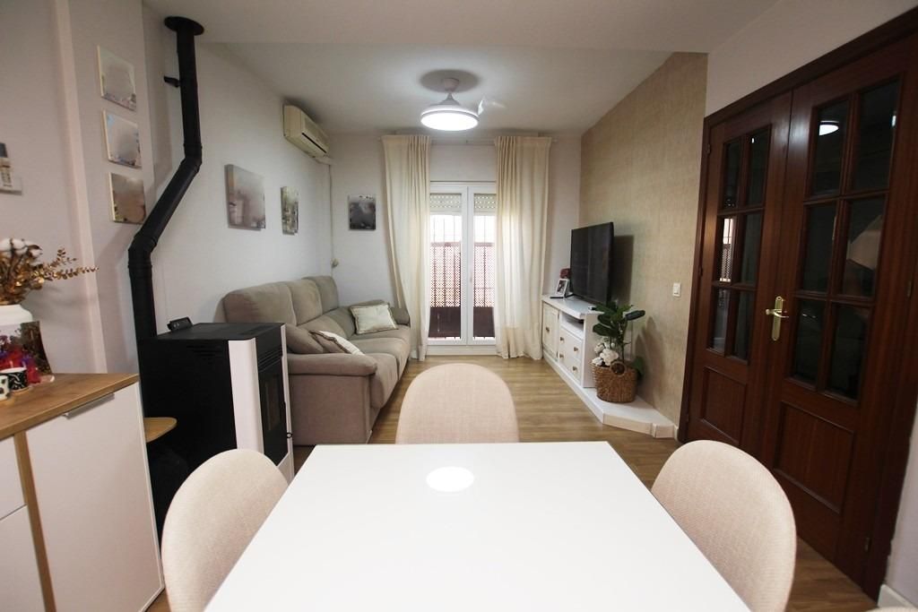 Sala de estar de Casa adosada en venta en Jerez de la Frontera con Aire acondicionado y Terraza