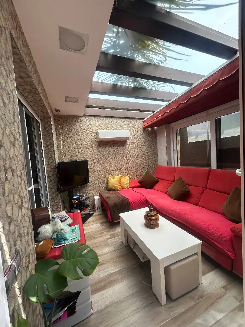 Wohnzimmer von Einfamilien-Reihenhaus zum Verkauf in Alhaurín de la Torre mit Klimaanlage, Privatgarten und Terrasse