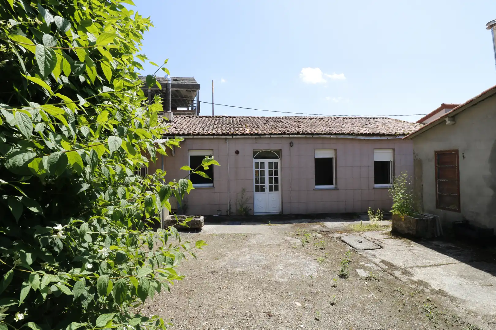 Vista exterior de Casa adosada en venta en Curtis con Calefacción, Jardín privado y Amueblado
