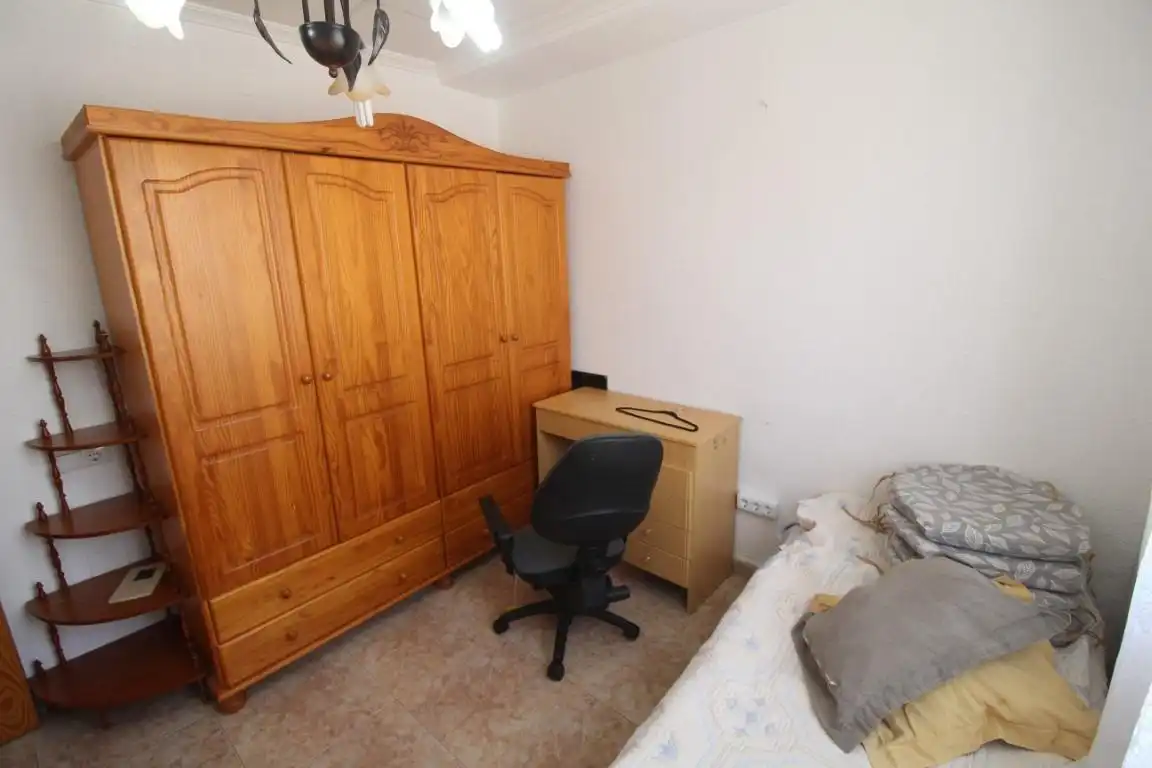 Habitación de Casa adosada en venta en Torrevieja con Aire acondicionado, Jardín privado y Terraza