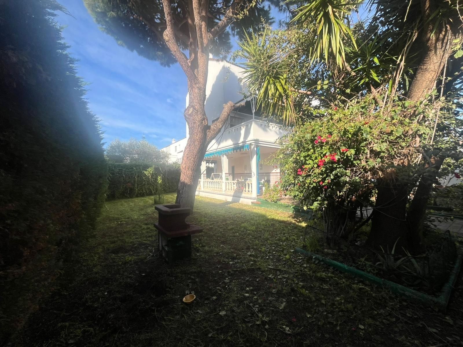 Jardí de Casa adosada en venda en El Portil amb Calefacció, Jardí privat i Terrassa
