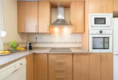 Cocina de Casa adosada en venta en Benalmádena con Aire acondicionado, Calefacción y Jardín privado