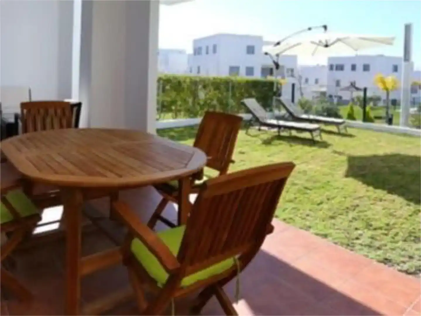 Terrassa de Pis de lloguer en Conil de la Frontera amb Aire condicionat, Jardí privat i Piscina