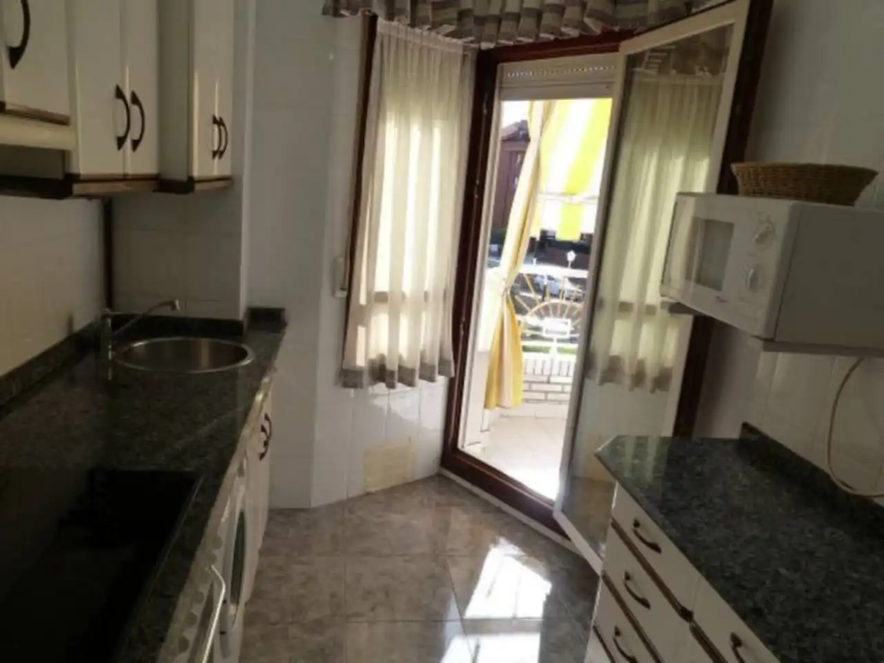 Cocina de Apartamento de alquiler en Noja con Calefacción, Amueblado y Piscina comunitaria