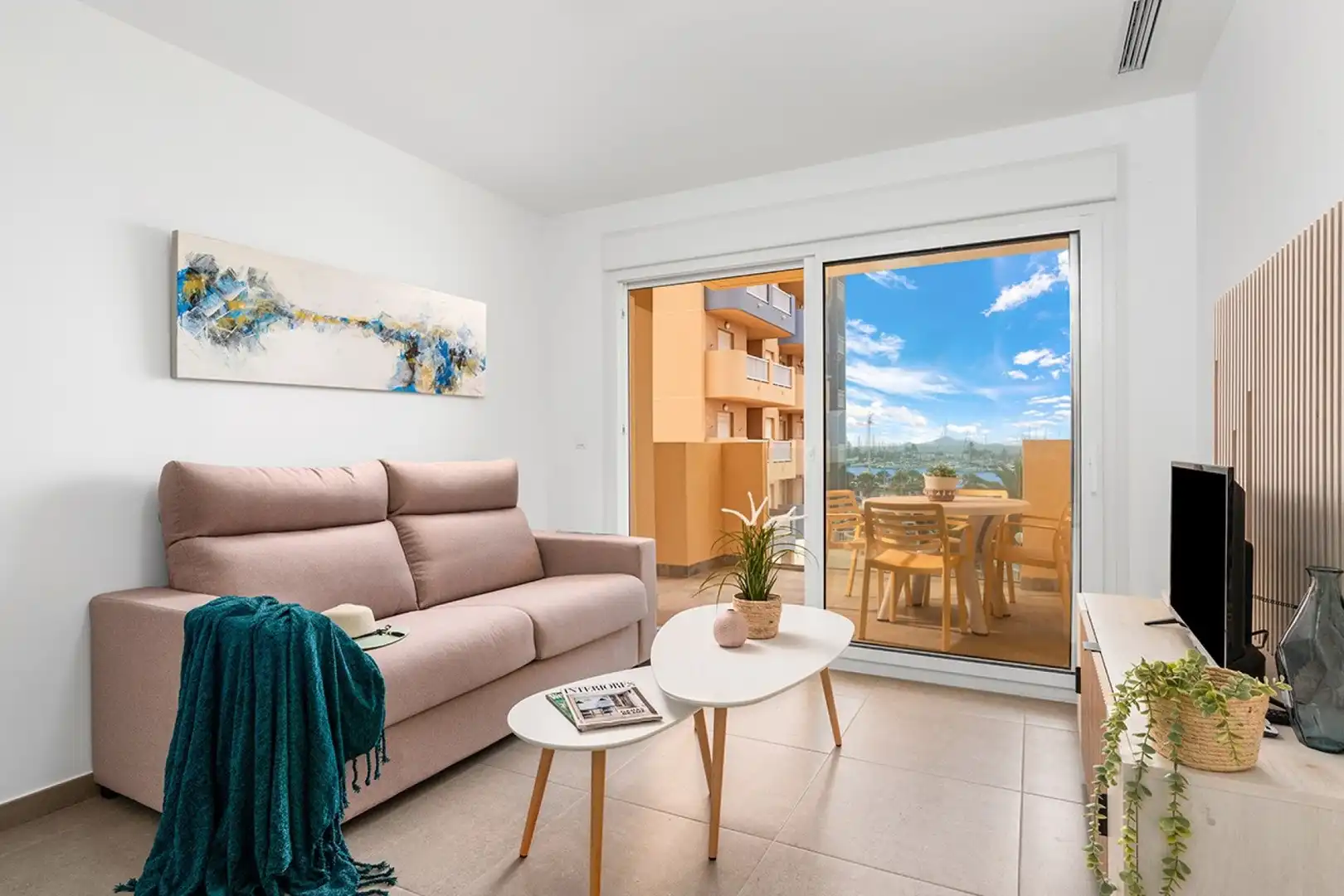 Sala de estar de Piso en venta en La Manga del Mar Menor con Aire acondicionado, Calefacción y Jardín privado
