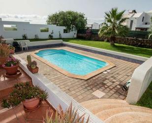 Piscina de Casa o xalet en venda en Tías amb Aire condicionat, Jardí privat i Terrassa