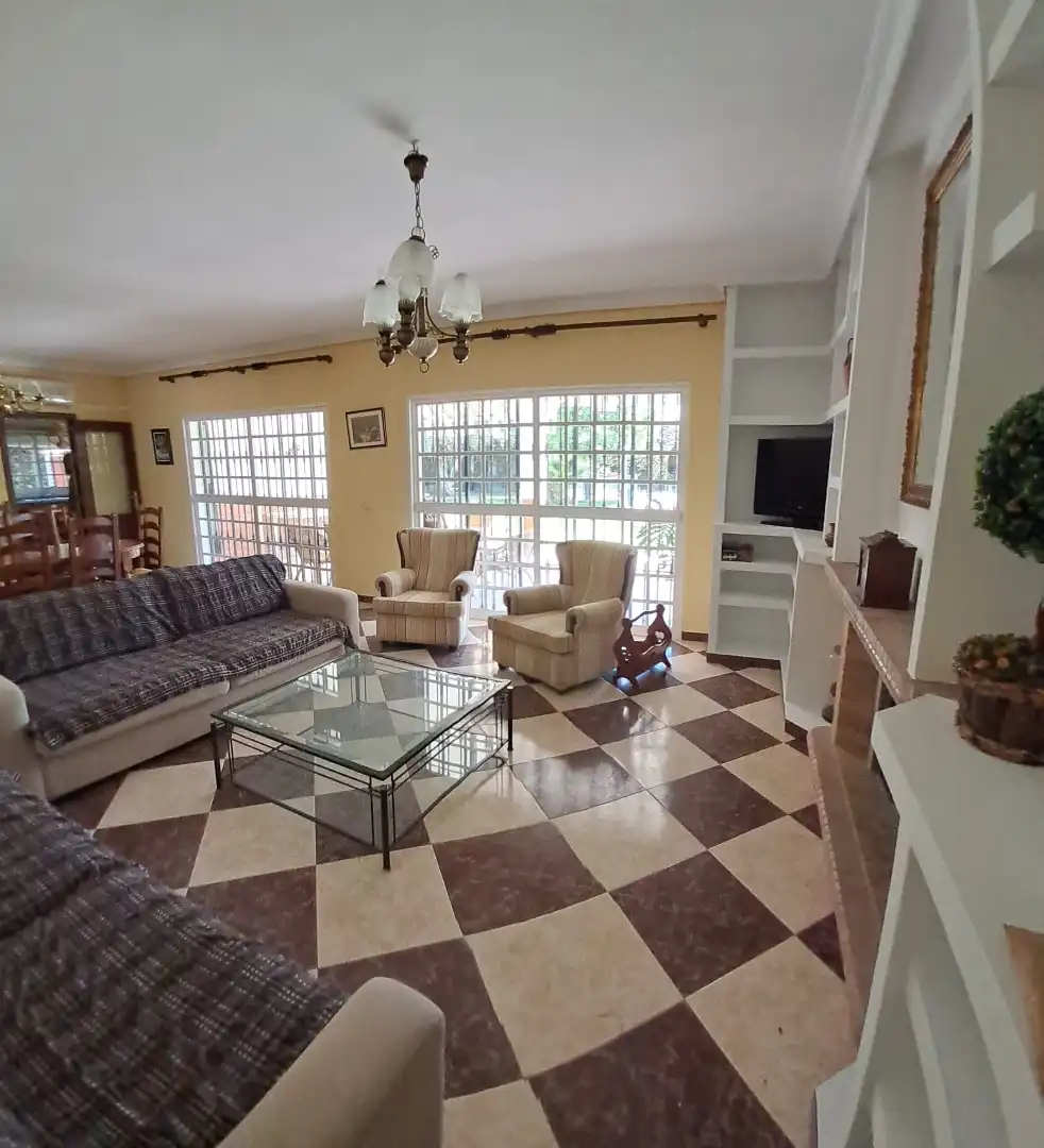 Sala de estar de Casa o chalet en venta en Palomares del Río con Aire acondicionado, Jardín privado y Terraza