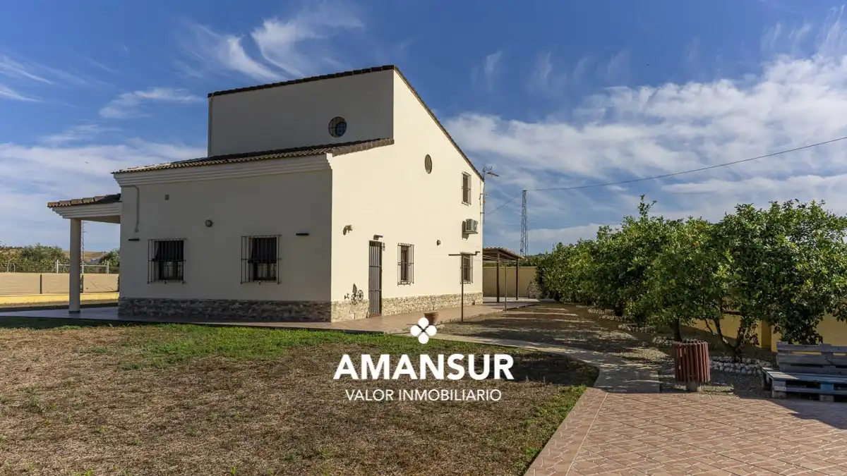 Vista exterior de Casa o xalet en venda en Villarrasa amb Aire condicionat, Calefacció i Jardí privat