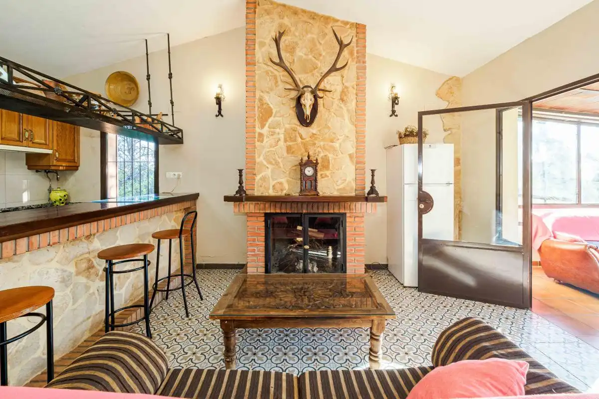 Sala de estar de Finca rústica en venta en Aracena con Aire acondicionado, Calefacción y Jardín privado