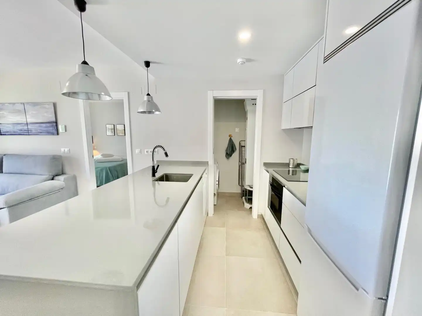 Cuina de Apartament de lloguer en Ayamonte amb Aire condicionat, Calefacció i Jardí privat