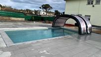 Swimming pool of House or chalet for sale in Caldes de Malavella  with Air Conditioner, Heating and Terrace