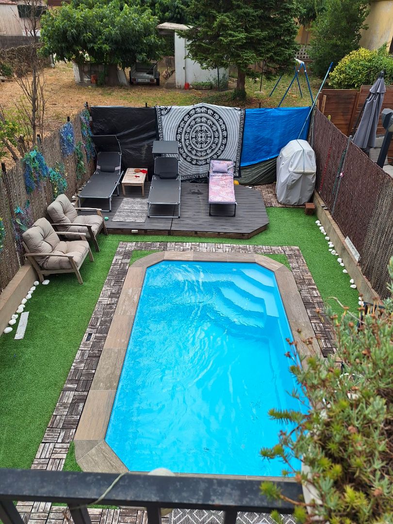 Piscina de Casa adosada en venda en Quart amb Aire condicionat, Calefacció i Jardí privat