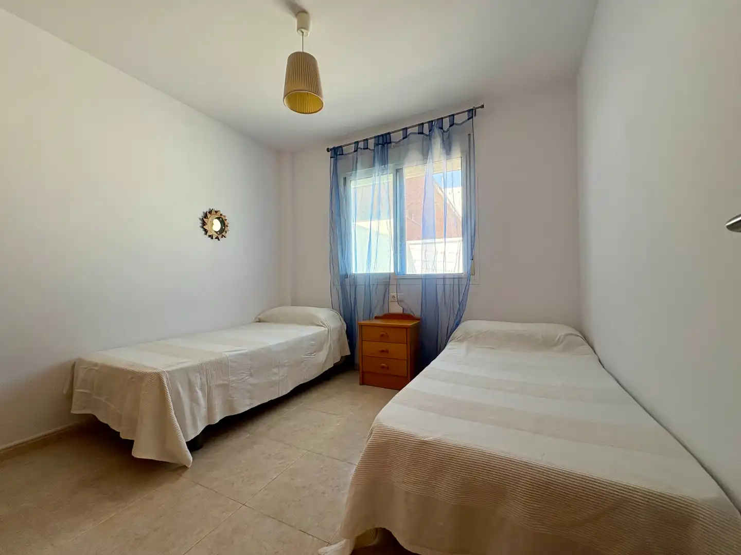 Dormitori de Casa adosada de lloguer en Sant Jaume d'Enveja amb Aire condicionat, Terrassa i Moblat