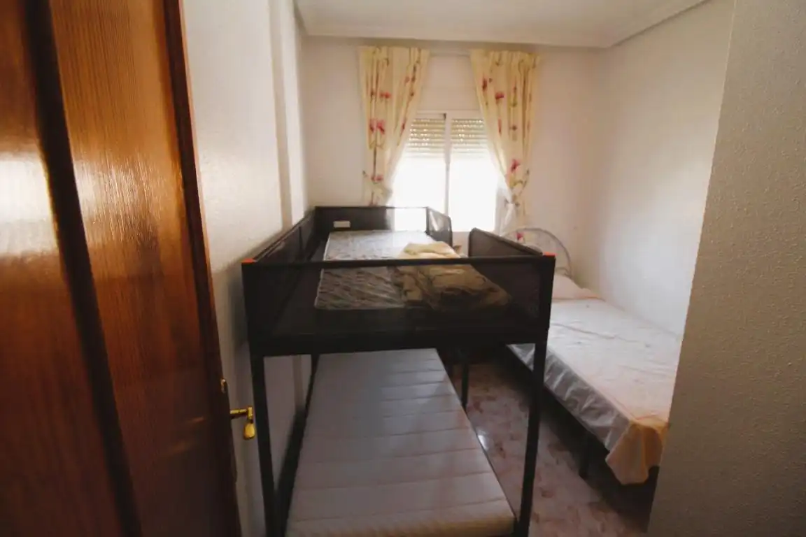 Dormitori de Casa adosada en venda en Orihuela amb Jardí privat, Terrassa i Moblat