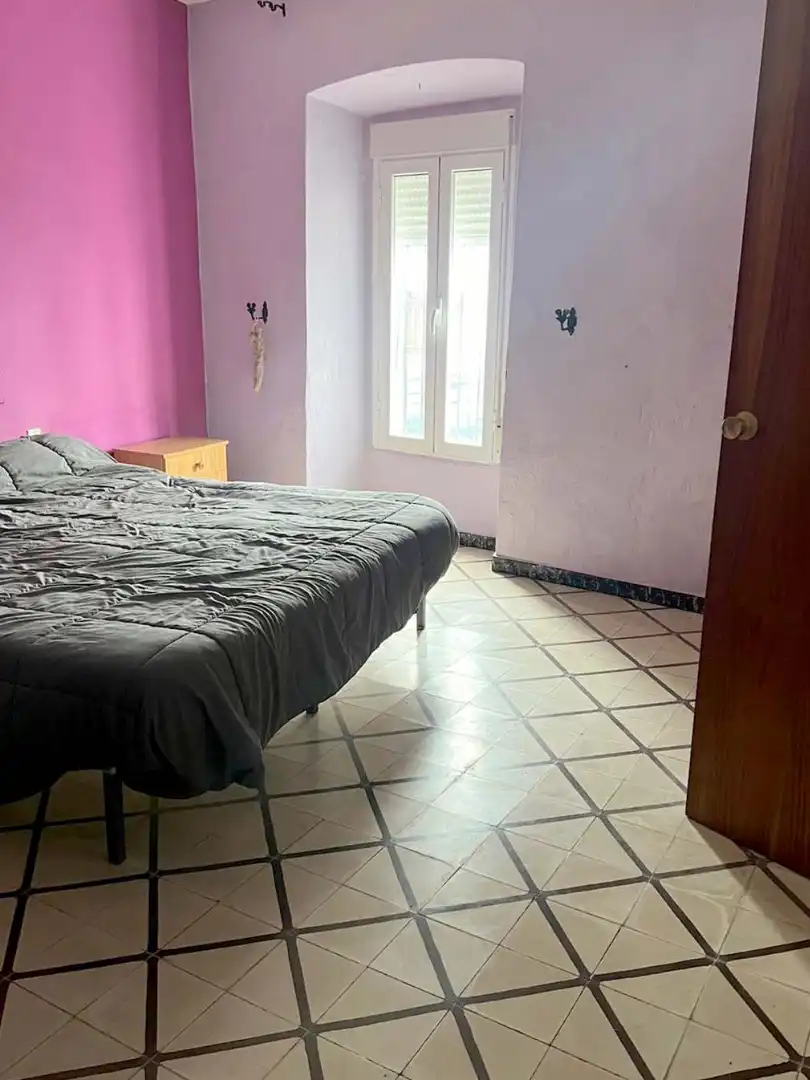 Dormitori de Casa adosada en venda en Higuera la Real amb Terrassa i Moblat