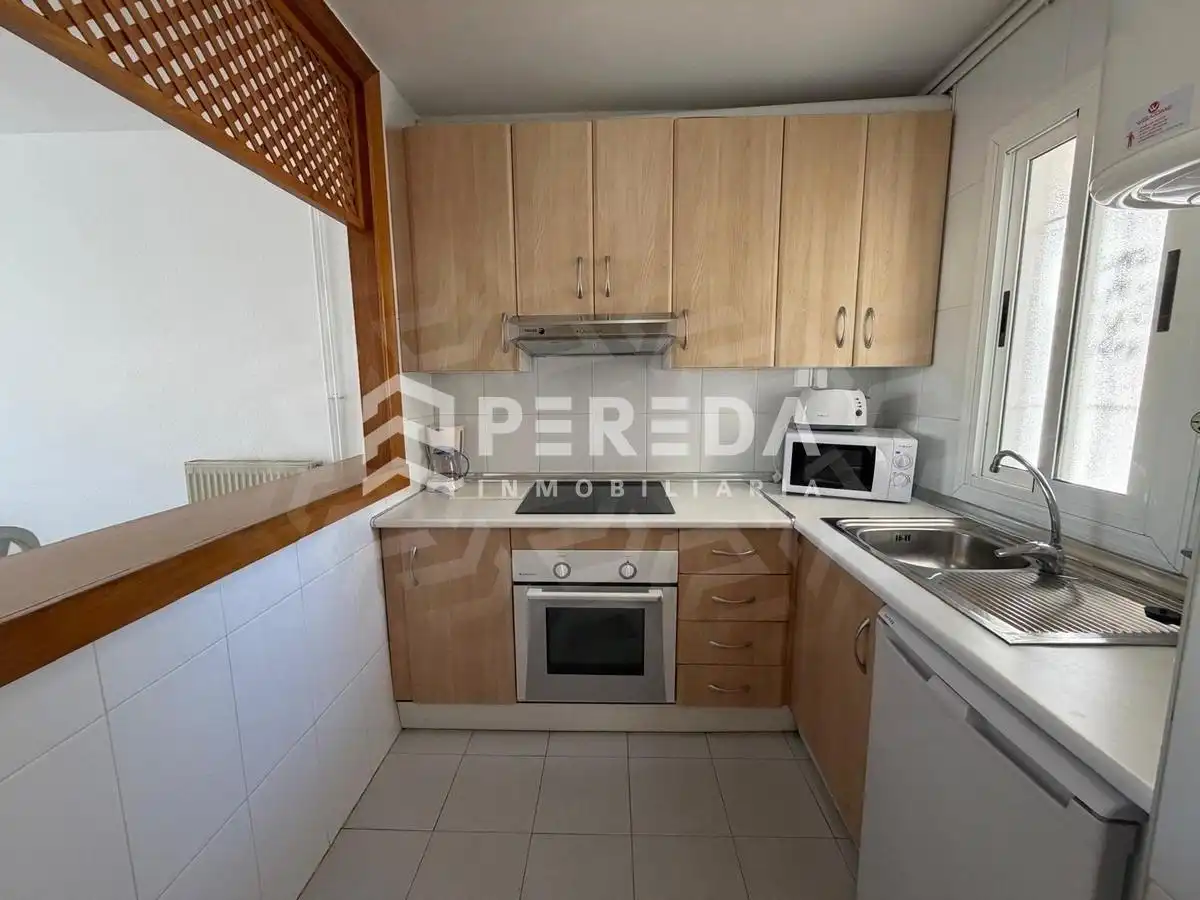 Cocina de Apartamento en venta en Roquetas de Mar con Aire acondicionado, Jardín privado y Terraza