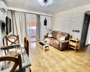 Living room of Flat for sale in Marbella  with Air Conditioner, Terrace and Furnished