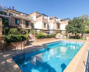 Swimming pool of Single-family semi-detached for sale in  Granada Capital  with Air Conditioner, Terrace and Balcony