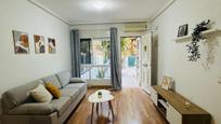 Sala d'estar de Casa adosada en venda en La Nucia amb Aire condicionat, Terrassa i Balcó