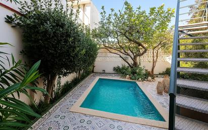 Piscina de Casa adosada en venda en San Pedro del Pinatar amb Aire condicionat, Jardí privat i Terrassa