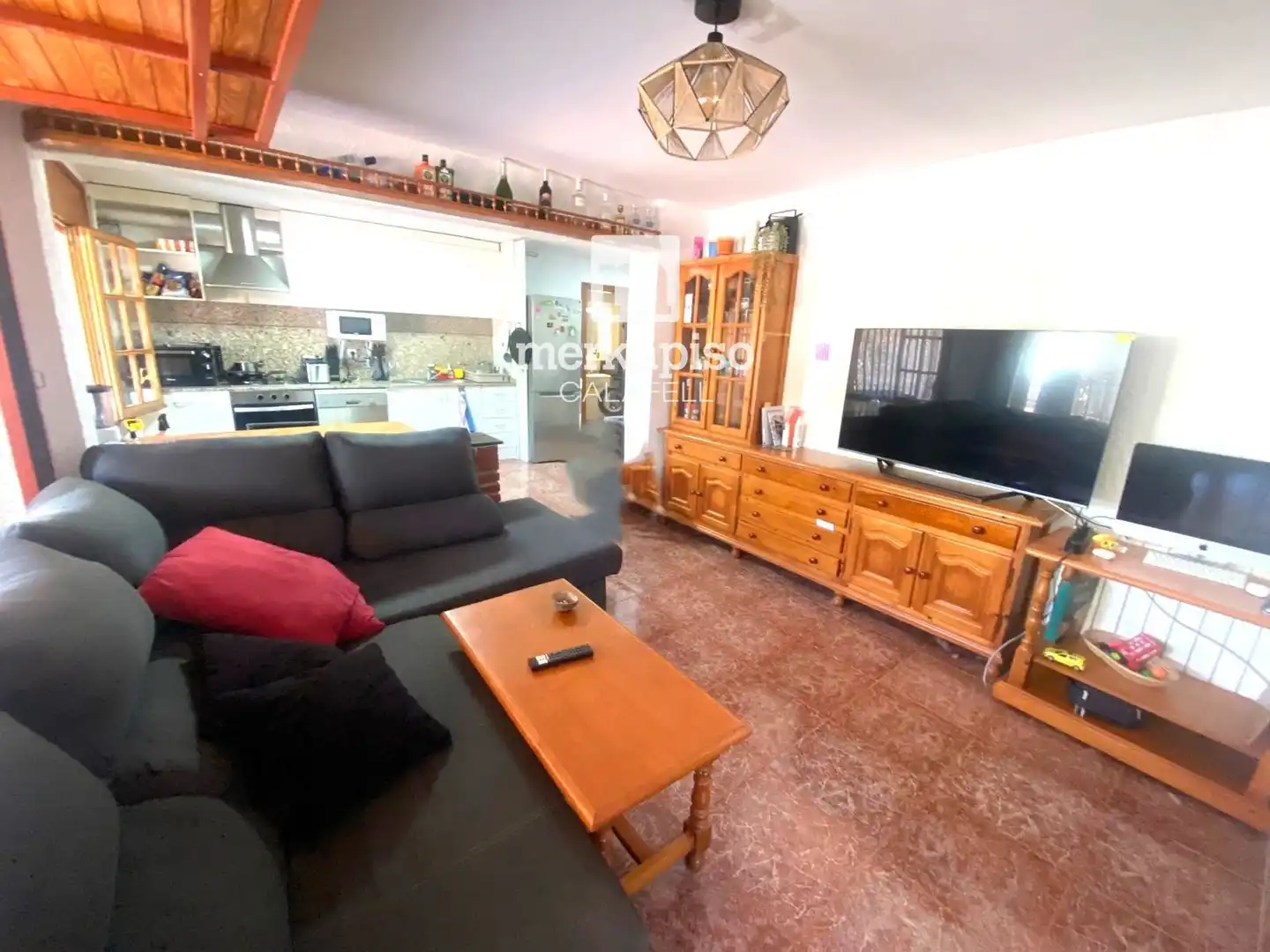 Sala d'estar de Casa o xalet en venda en Cunit amb Jardí privat, Terrassa i Traster
