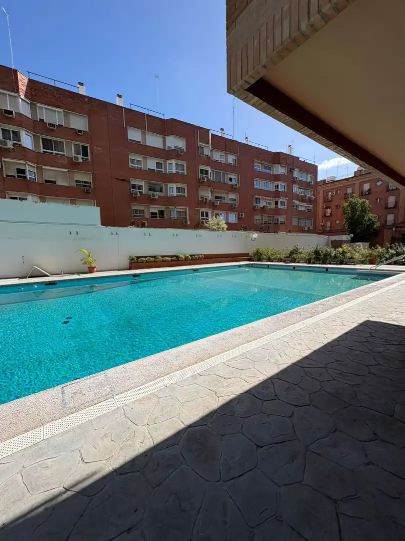 Swimming pool of Flat for sale in Sevilla  with Air Conditioner, Heating and Terrace