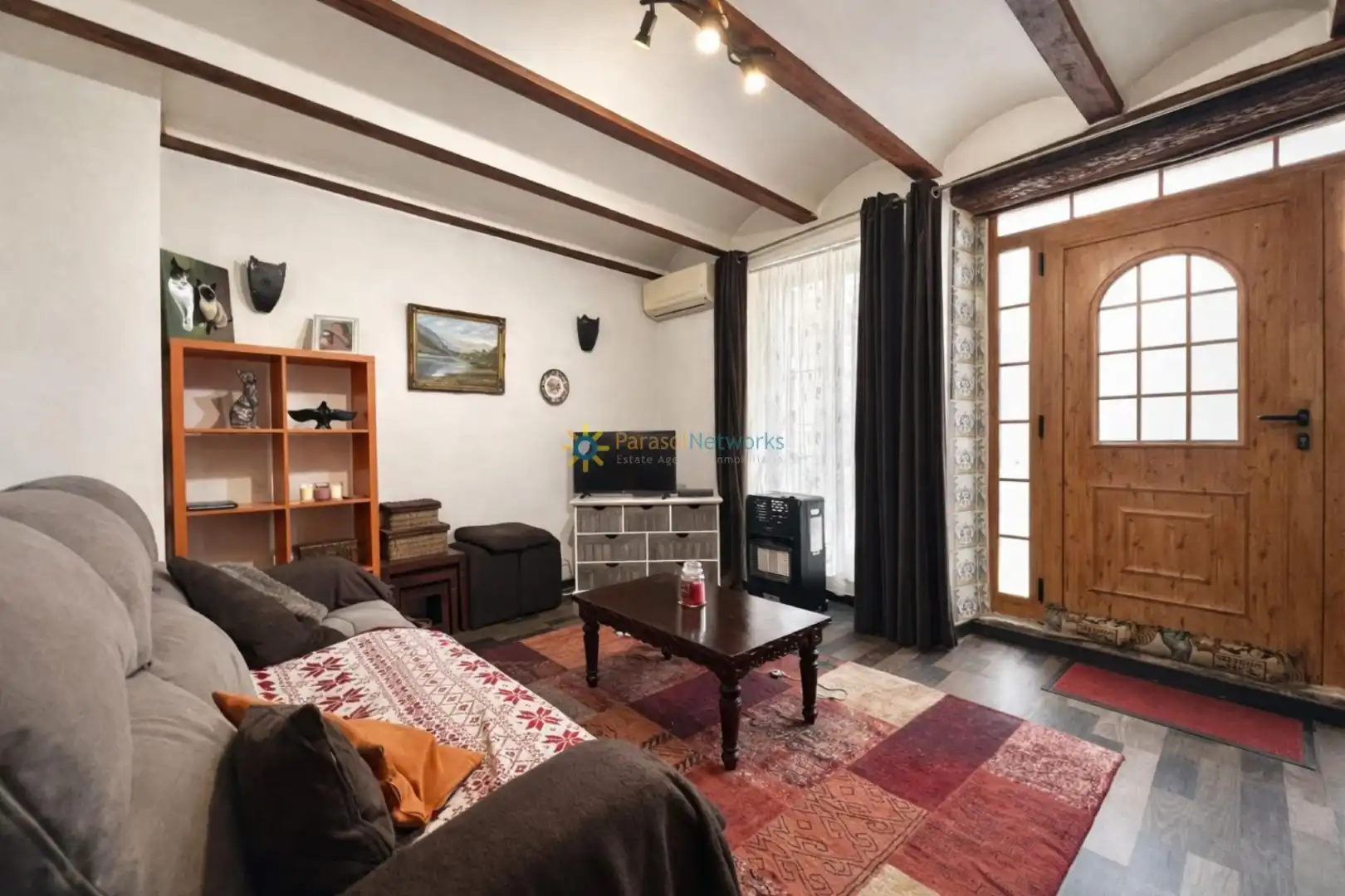 Sala d'estar de Casa adosada en venda en El Palomar amb Terrassa i Traster