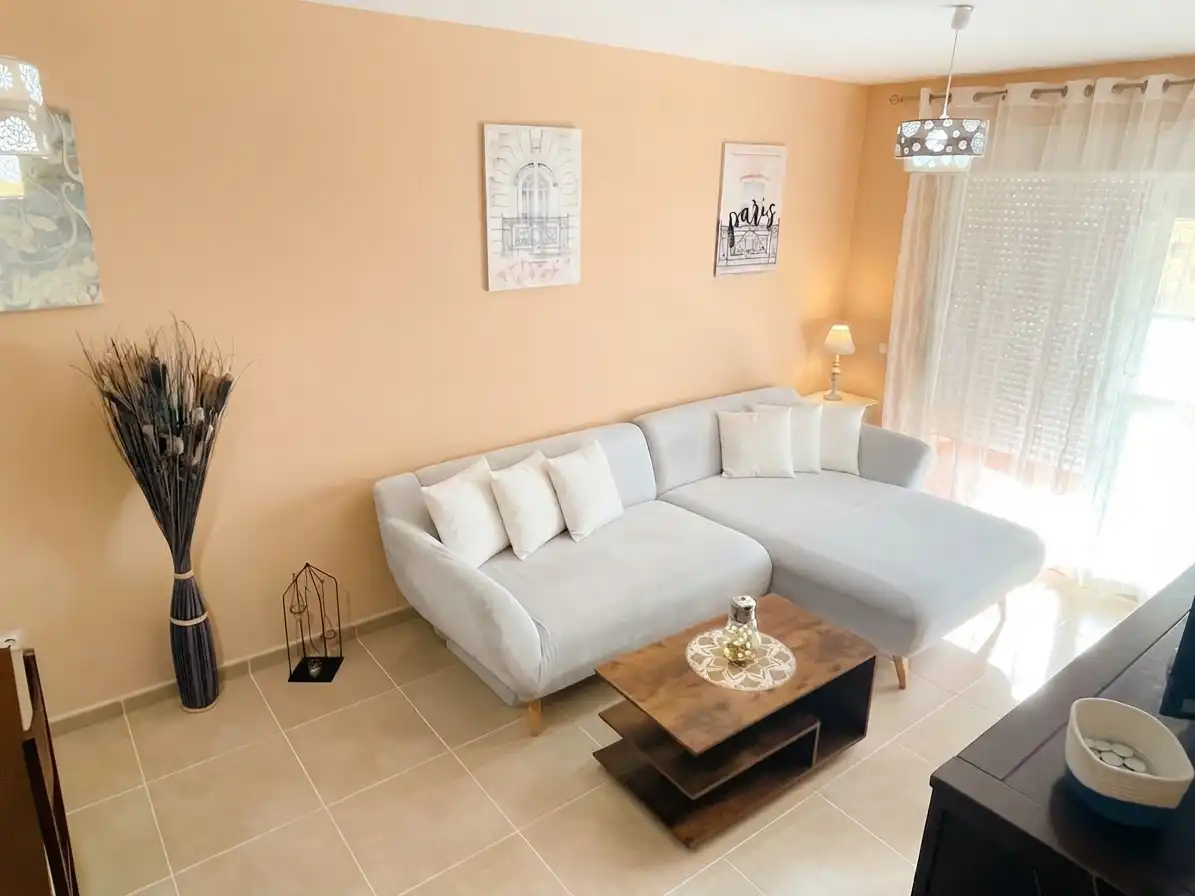 Sala de estar de Piso en venta en Torrox con Terraza, Amueblado y Piscina comunitaria