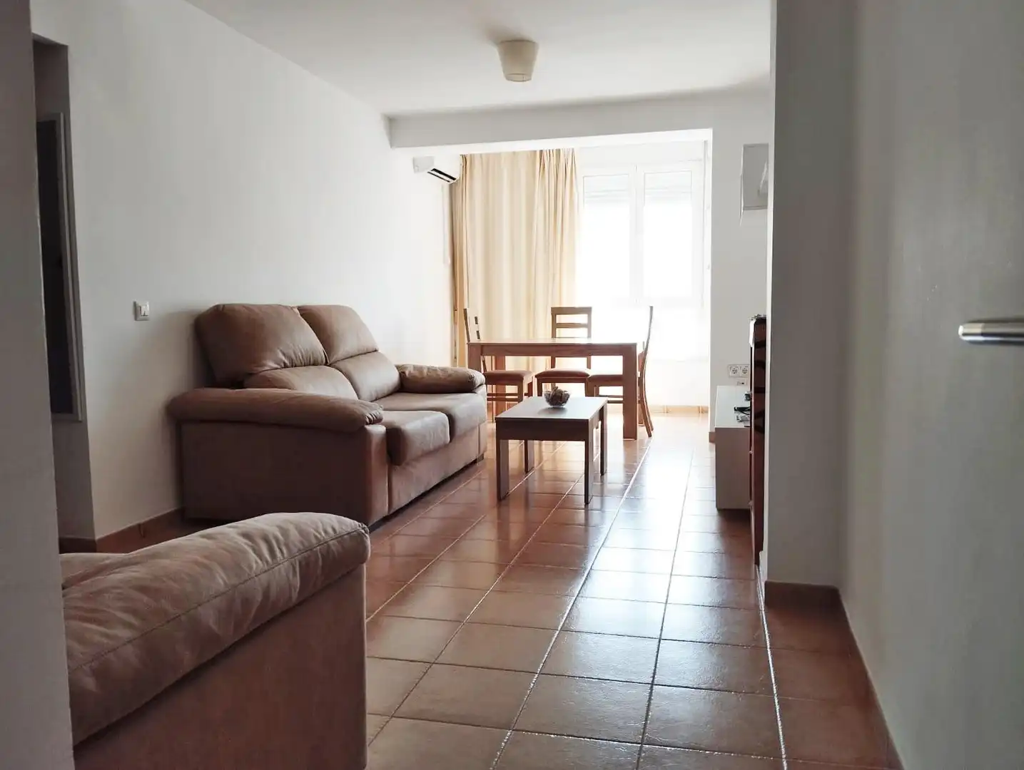 Sala de estar de Apartamento de alquiler en Chiclana de la Frontera con Aire acondicionado y Amueblado