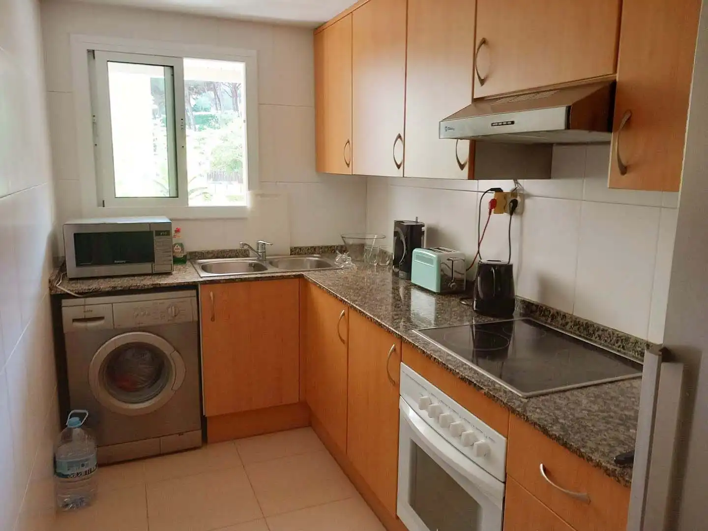 Kitchen of Flat for sale in Lloret de Mar  with Air Conditioner, Terrace and Furnished