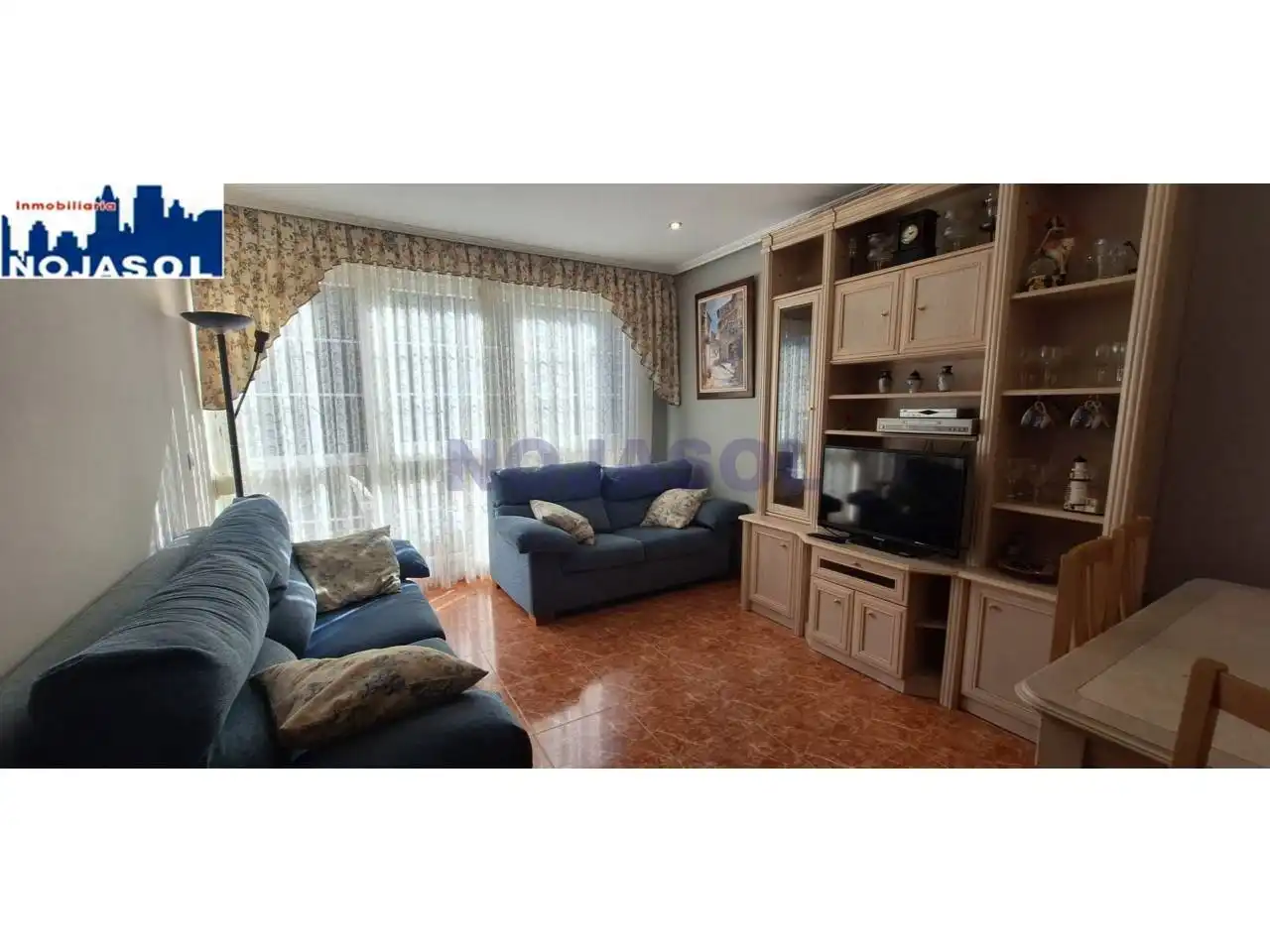 Sala d'estar de Apartament de lloguer en Noja amb Calefacció, Terrassa i Moblat