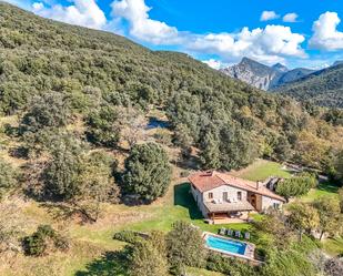 Vista exterior de Finca rústica en venda en Montagut i Oix amb Jardí privat, Terrassa i Piscina