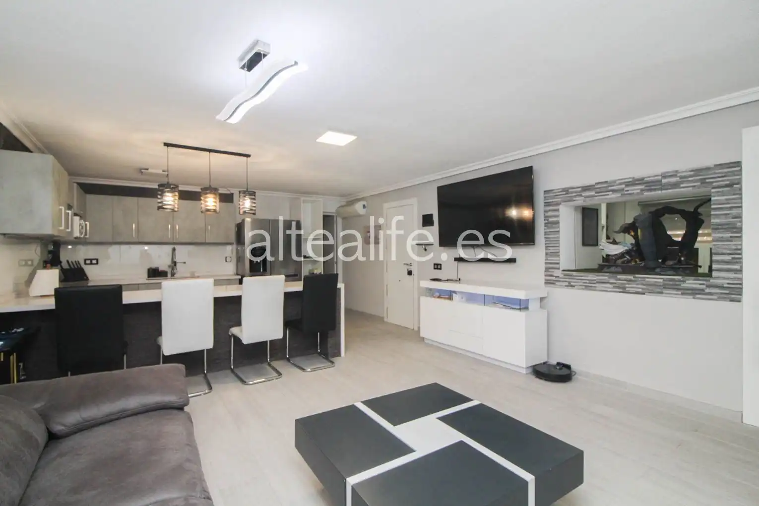 Sala de estar de Casa o chalet en venta en L'Alfàs del Pi con Aire acondicionado, Calefacción y Jardín privado