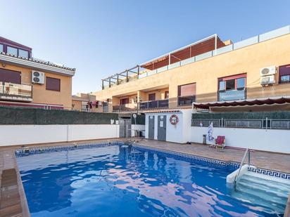 Swimming pool of Planta baja for sale in Armilla  with Heating, Parquet flooring and Terrace