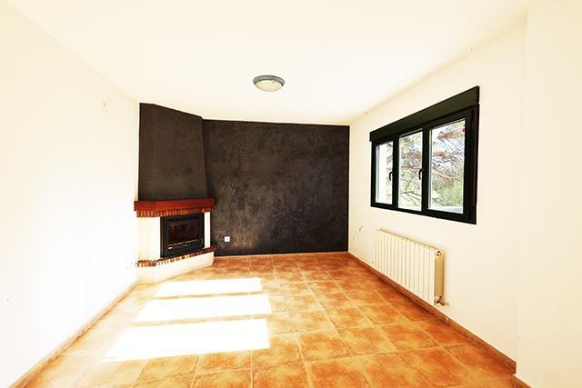 Sala d'estar de Casa o xalet en venda en Manzanares El Real amb Calefacció i Jardí privat