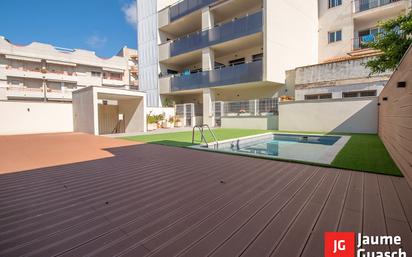 Swimming pool of Planta baja for sale in Torredembarra  with Air Conditioner, Heating and Terrace