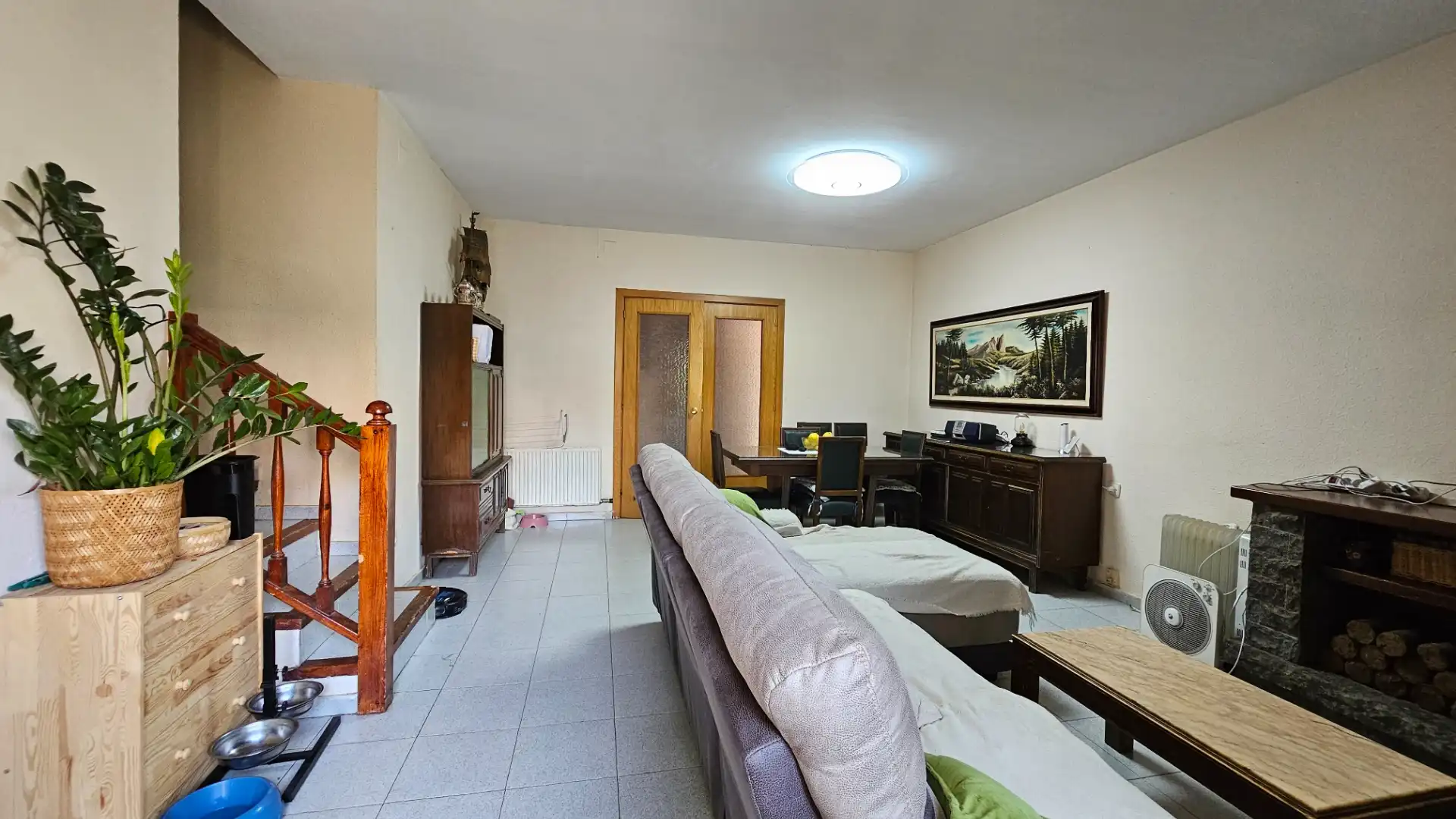 Sala d'estar de Casa adosada en venda en Sabadell amb Calefacció, Terrassa i Forn