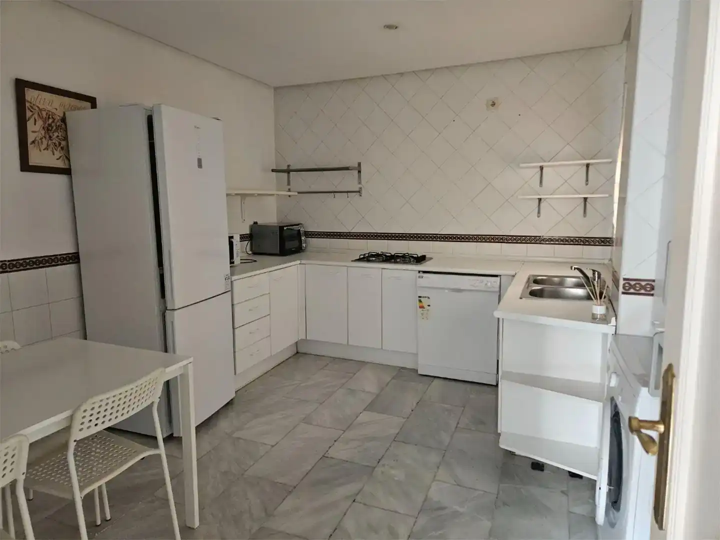 Cuina de Pis en venda en San Juan de Aznalfarache amb Aire condicionat i Piscina