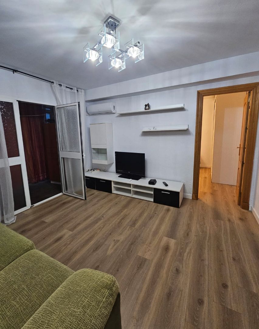 Living room of Flat to rent in Coín  with Air Conditioner, Heating and Parquet flooring