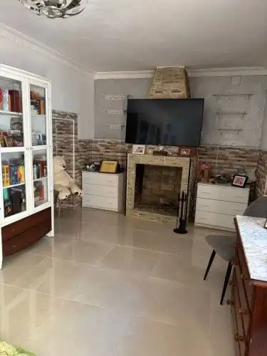 Sala d'estar de Casa adosada en venda en Gibraleón amb Aire condicionat i Calefacció