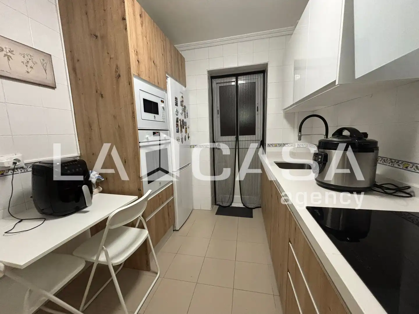 Kitchen of Flat for sale in Dos Hermanas  with Storage room and Balcony