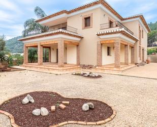 Vista exterior de Casa o xalet en venda en Benidoleig amb Aire condicionat, Calefacció i Jardí privat