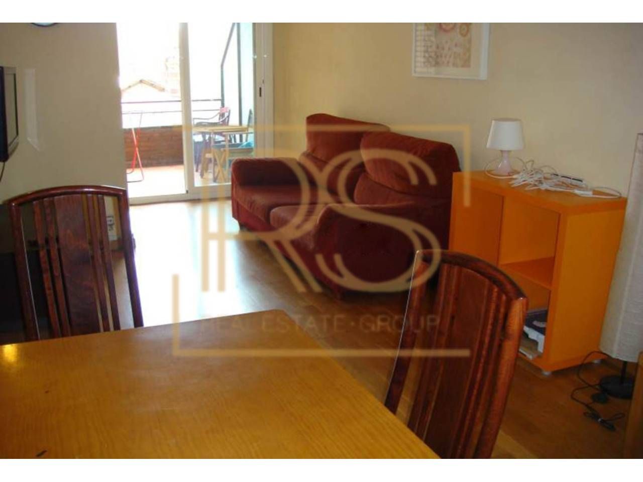 Sala d'estar de Pis de lloguer en  Barcelona Capital amb Parquet i Moblat