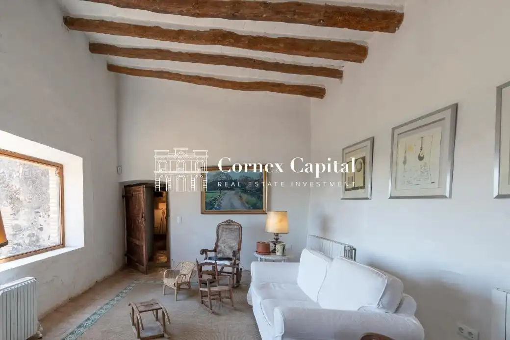 Sala de estar de Finca rústica de alquiler en Rupià con Aire acondicionado, Calefacción y Jardín privado