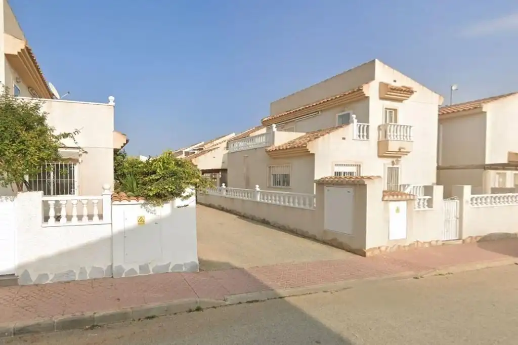 Vista exterior de Casa adosada en venta en Rojales con Jardín privado, Terraza y Piscina comunitaria